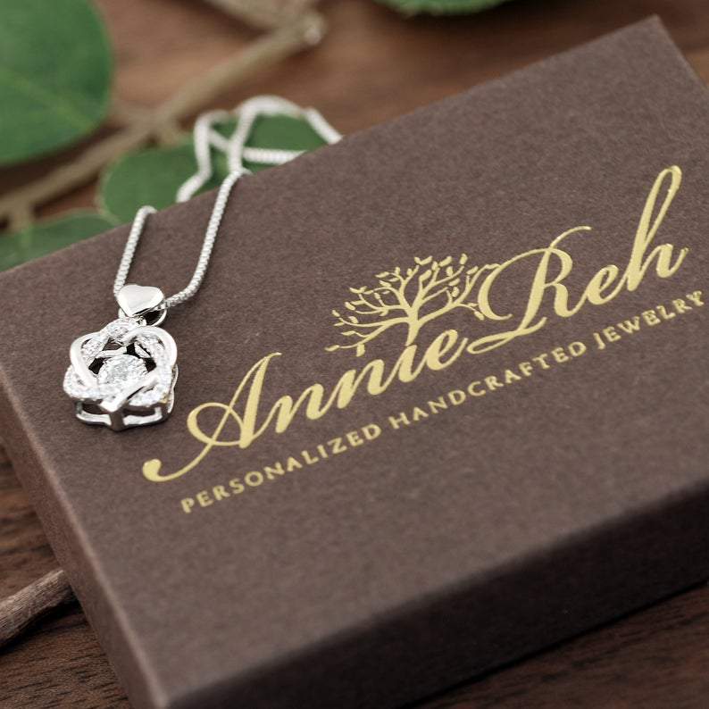 Silver Cubic Zirconia Interlocking Hearts Necklace.