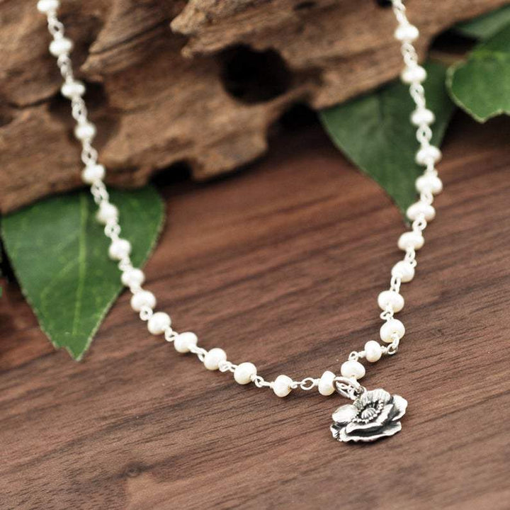 Tiny Silver Poppy Flower Necklace with Pearl Chain.