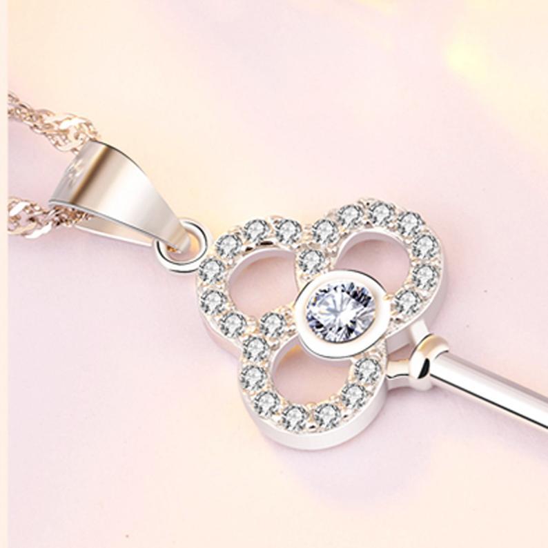 Sterling silver key necklace with Cubic Zirconia.