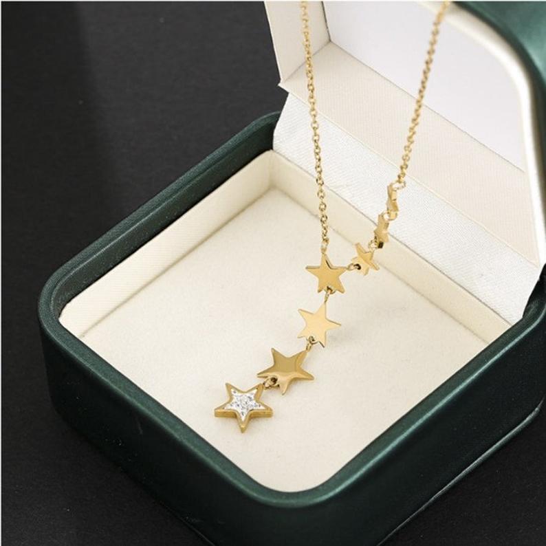 Stainless Steel Cascading Star Necklace.