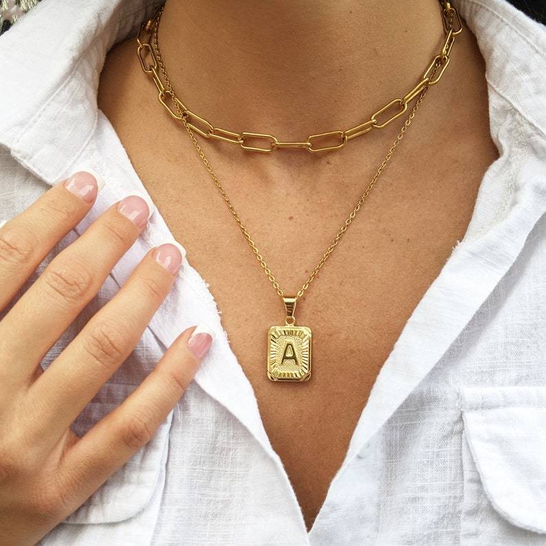 Silver Burst Initial Necklace.