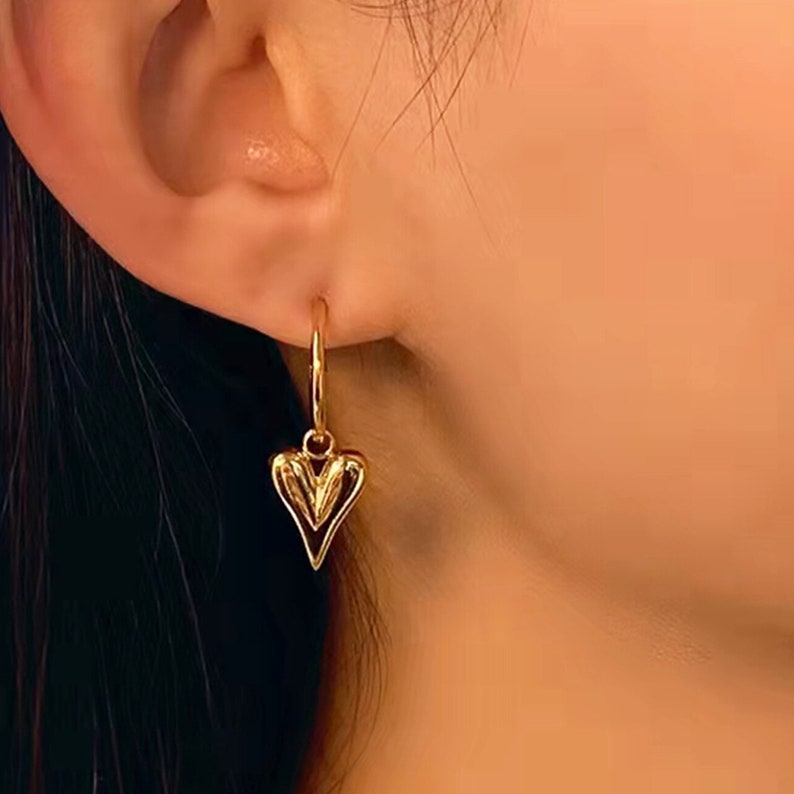 Elongated Dangling Heart - Hoop Earrings.