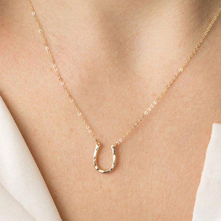 Gold Horseshoe Necklace.