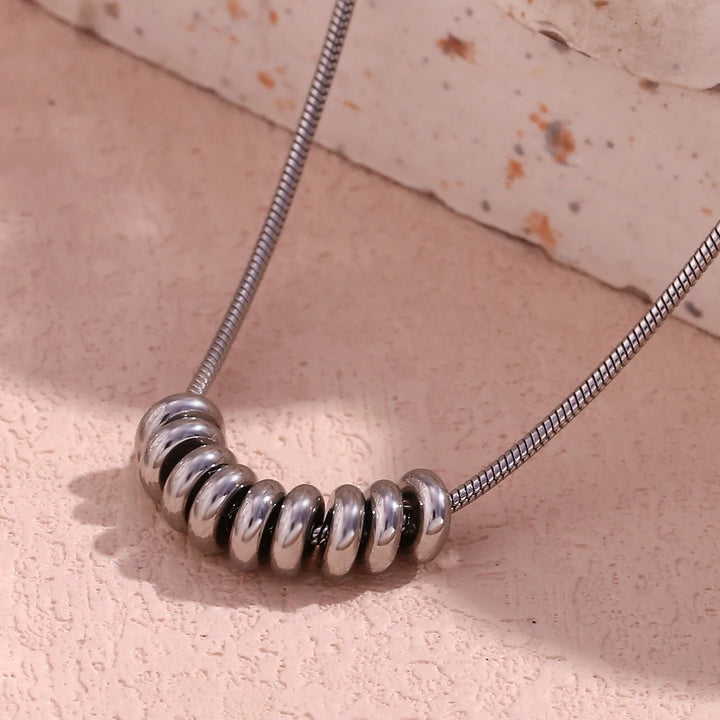 Isla Necklace (Stacked Rings Pendant)