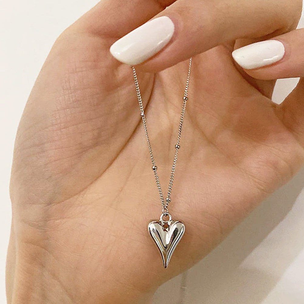 Sterling Silver Puffed Heart Necklace with Satellite Chain.