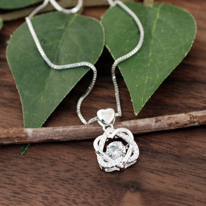 Silver Cubic Zirconia Interlocking Hearts Necklace.