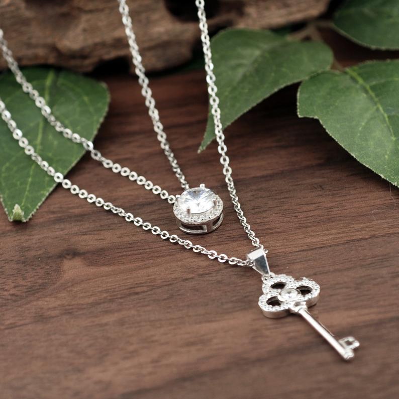 Sterling silver key necklace with Cubic Zirconia.