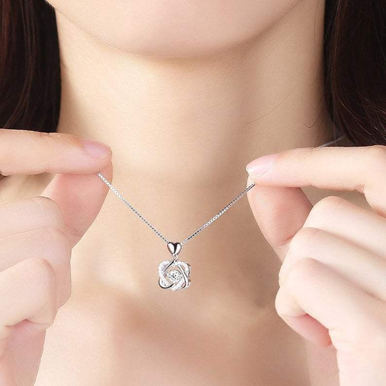 Silver Cubic Zirconia Interlocking Hearts Necklace.