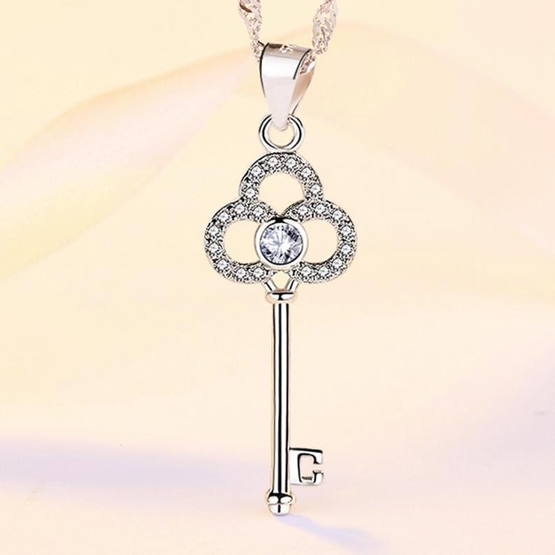 Sterling silver key necklace with Cubic Zirconia.