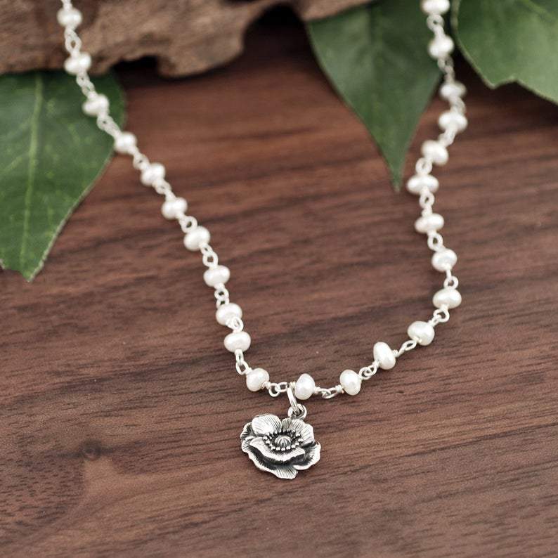 Tiny Silver Poppy Flower Necklace with Pearl Chain.