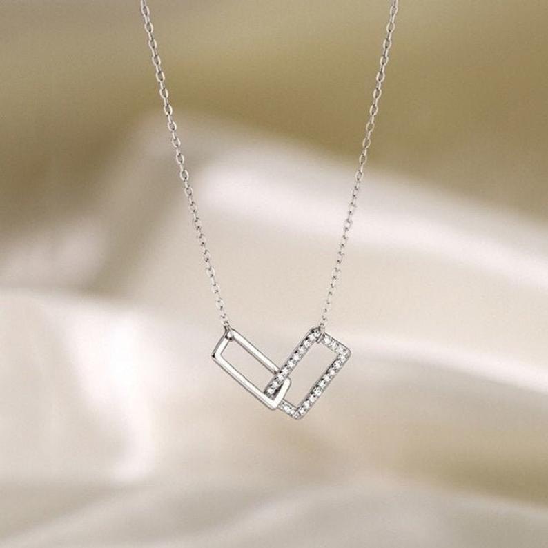 Sterling Silver Rectangular Pendant with Cubic Zirconia.