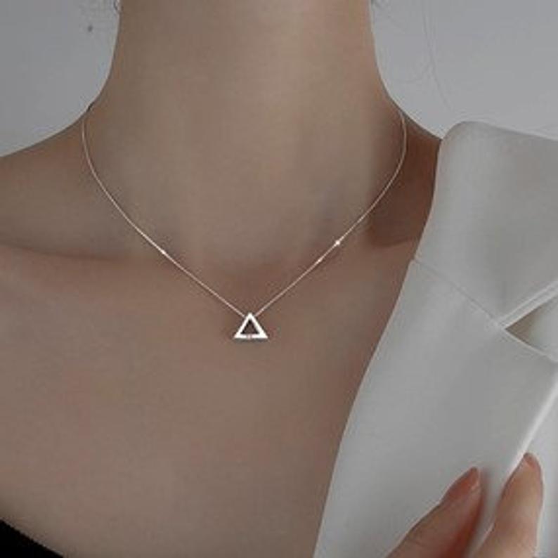 Sterling Silver Triangle Necklace with Cubic Zircon.