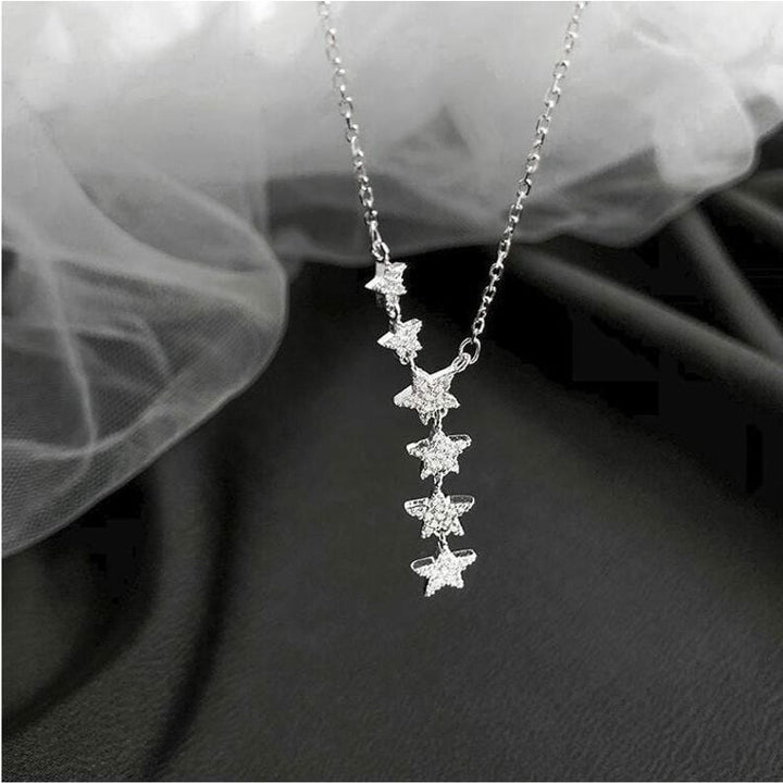 Sterling Silver Cascading Star Charm Necklace.