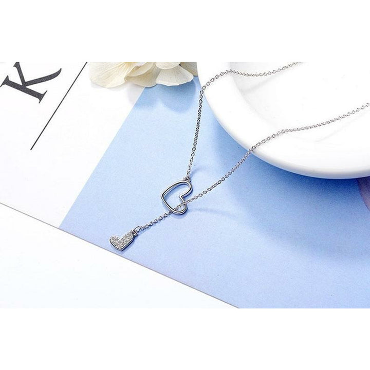 Sterling Silver Double Heart Lariat Necklace.