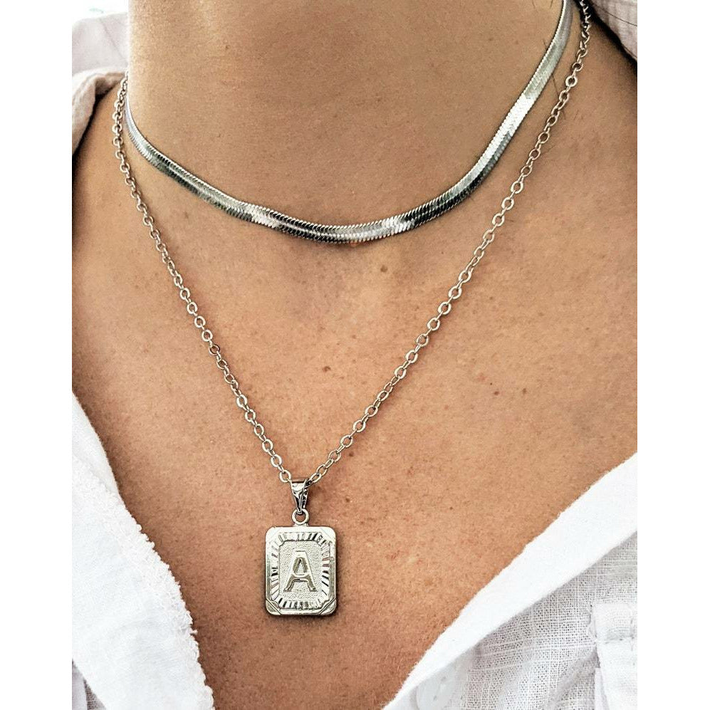 Silver Burst Initial Necklace.